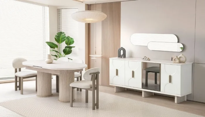 Traverten gövde yapısı ve aytaşı ön kapak kombinasyonuyla tasarlanmış Milano yemek odası takımı; oval masa, dikey çıtalı konsol ve uyumlu sandalye seti.