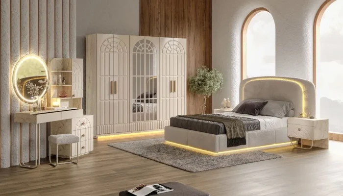 Modern ve lüks tasarıma sahip Anatolia yatak odası takımı; ışıklı yatak başlığı, kemerli aynalı gardırop ve LED aynalı makyaj masası ile eksiksiz set görünümü.