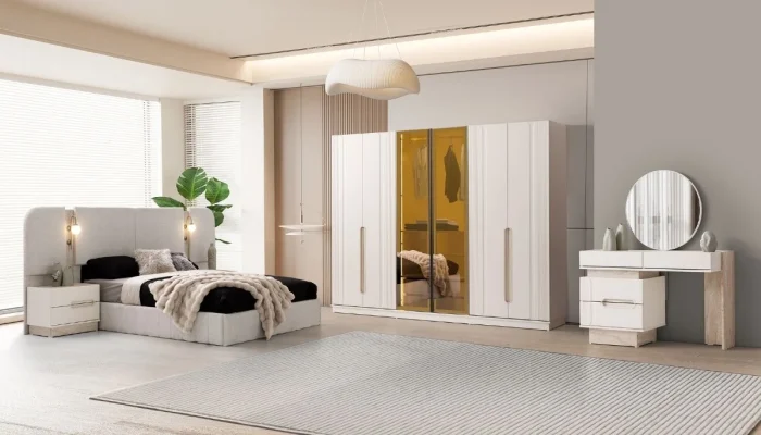 Modern Vera Yatak Odası Takımı genel görünümü; gri ve antrasit tonlarında, dikey dikişli yatak başlığı, komodinler ve makyaj masası içeren tam set.